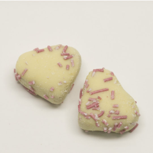 Soft strong salmiak liquorice covered in white chocolate, german