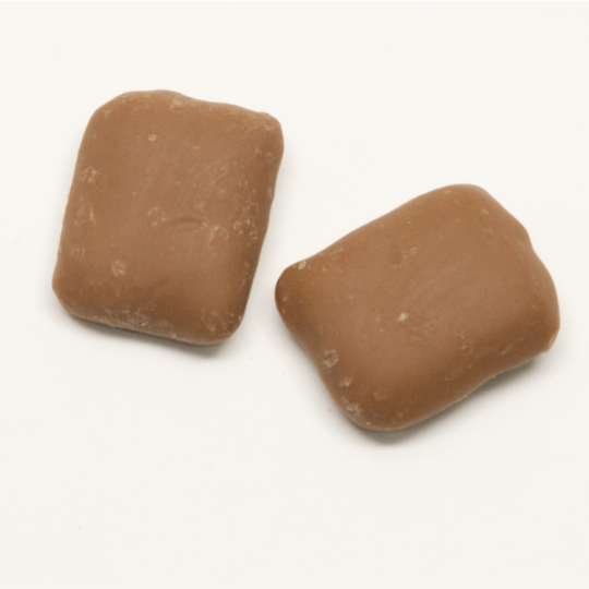 Crunchy salmiak brittle covered in milk chocolate, german