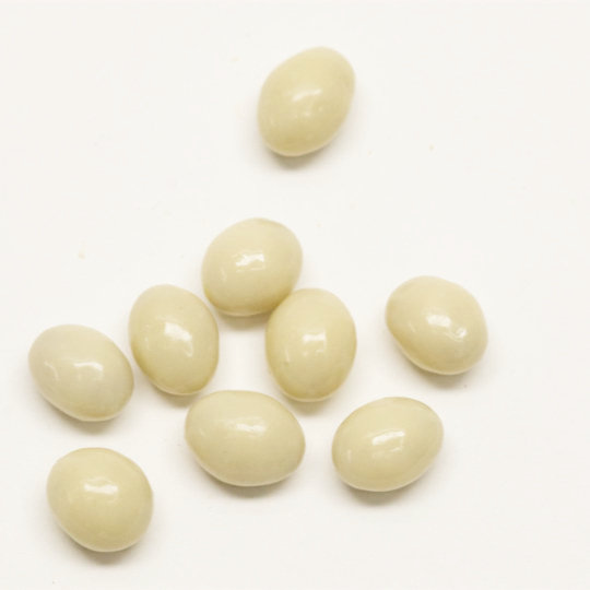 Tangy salmiac liquorice covered in white chocolate, german