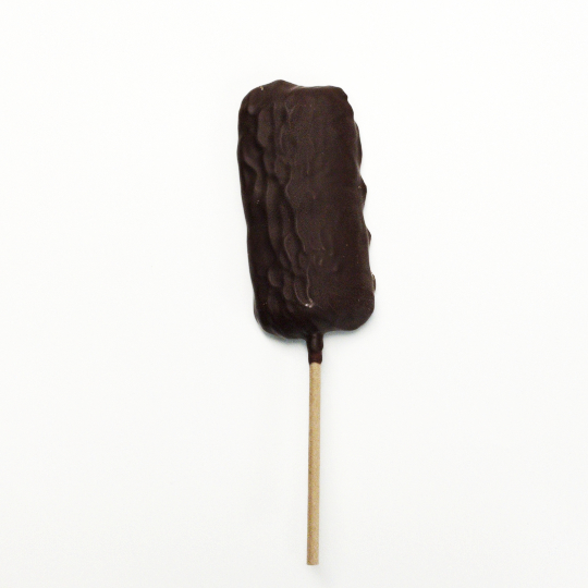 Salmiak lollypop covered in dark chocolate, german