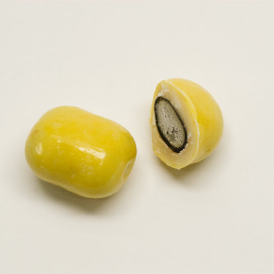 Liquorice coated with white choclate and citron, swedish