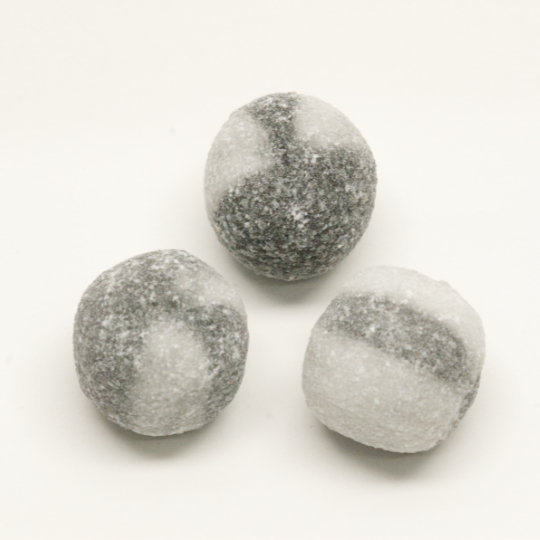 Liquorice bonbons with a semi strong salmiak filling, dutch