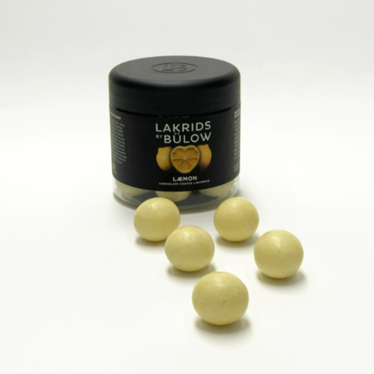 Box liquorice marbles with white chocolate and lemon fruit by johan buelow, danish