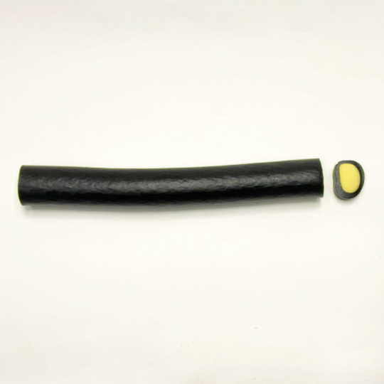 Mild liquorice cane filled with lemon, finnish