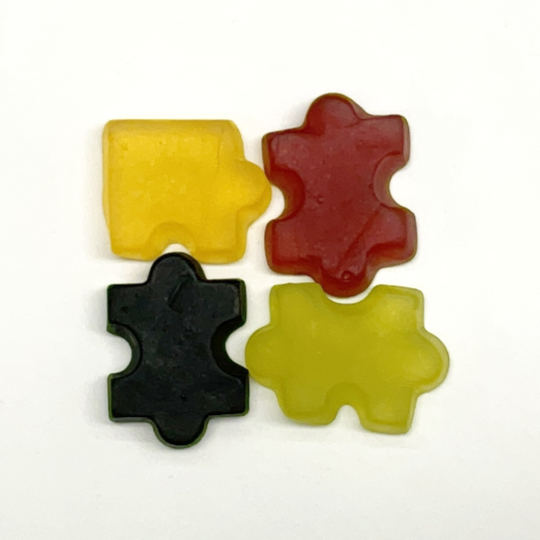 Aromatic liquorice puzzle with wine gum, finnish