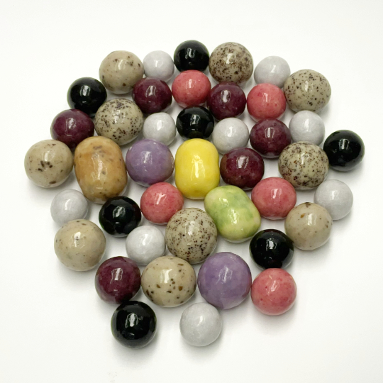 Mix of marbles with chocolate and liquorice kernel, swedish