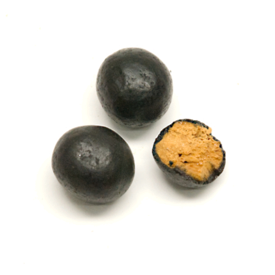 Tangy liquorice marbles filled with sweet-salty salmiac, dutch